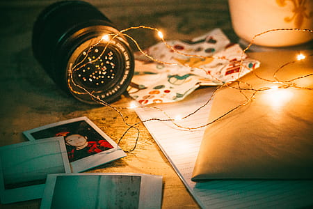 yellow string light with camera lens thumbnail