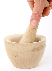 person holding mortar with pestle thumbnail