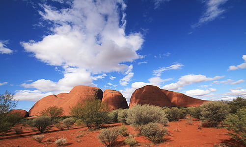 brown mountains under blue sky during daytime thumbnail