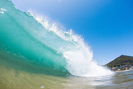 Waves crashing on the beach thumbnail