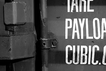 Close-up crop of an old metal shipping container. Image captured in Faversham, Kent, England thumbnail