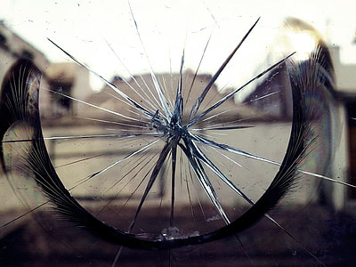 shallow focus photography of cracked glass thumbnail