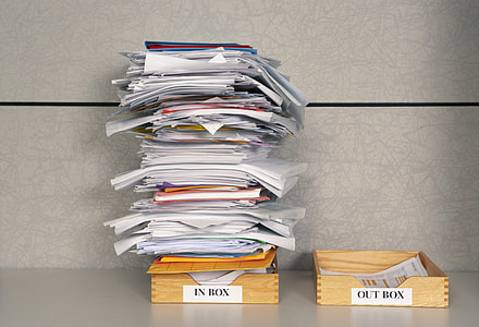 photo of pile of documents in box thumbnail