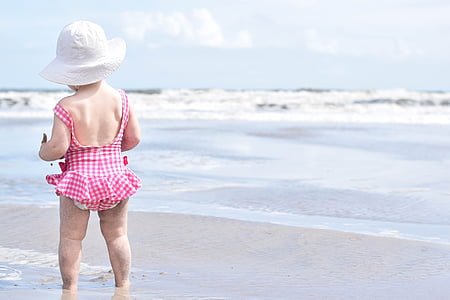 girl wearing red and white checked monokini near sea thumbnail