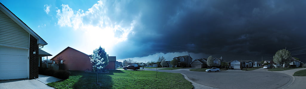 houses under gray clouds thumbnail