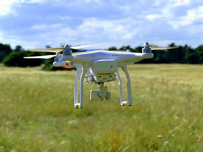 shallow focus photo of white DJI Phantom quadcopter drone thumbnail