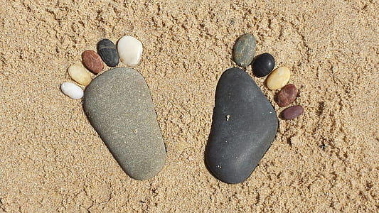 multicolored feet-shaped marble stones thumbnail