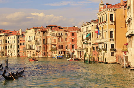 person riding boat on body of water thumbnail