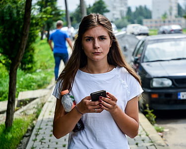 Woman Holding Smartphone thumbnail