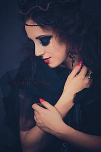 woman wears black dress and ring thumbnail