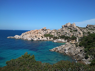 rock formation in front of sea during daytime thumbnail