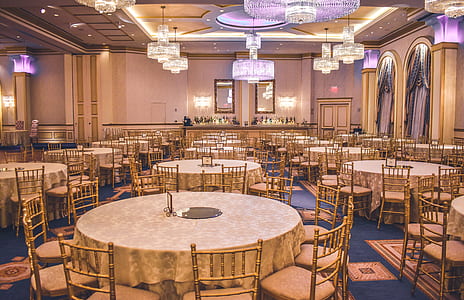 assorted-color round table and chair set inside restaurant thumbnail
