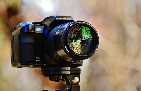 selective focus photography of black DSLR camera thumbnail
