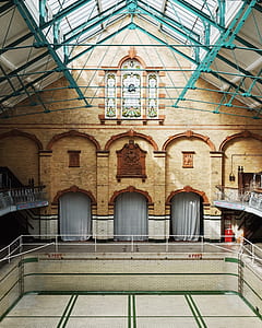 beige brick building interior thumbnail