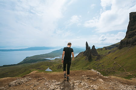 man wearing black shirt walking thumbnail