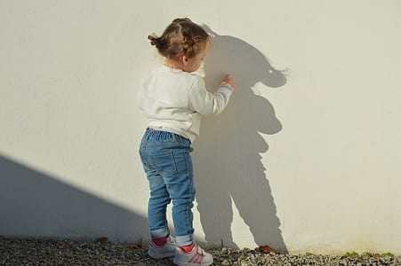 girl in white long-sleeved shirt thumbnail