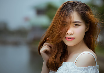 woman smiling in white spaghetti top thumbnail