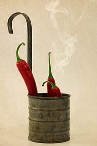 three red chili in gray bucket thumbnail