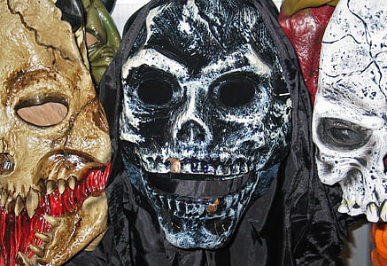three brown, black, and white skullhead vinyl masks thumbnail