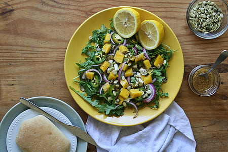 green salad on white ceramic plates thumbnail