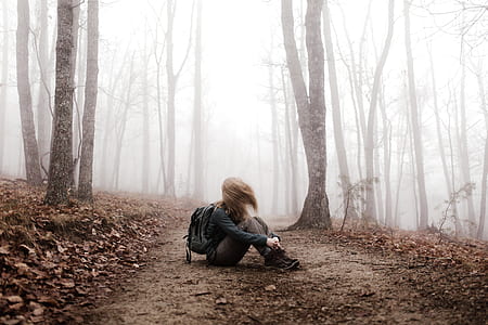 woman in the middle of forest during daytime thumbnail
