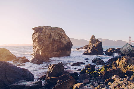 body of water crashing on rocks thumbnail