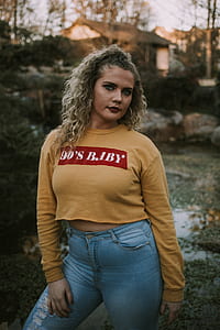 woman wearing yellow sweatshirt thumbnail
