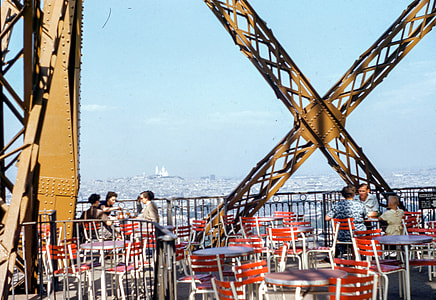 people sitting on chairs near railings thumbnail