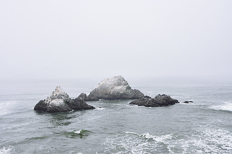 rocks in sea waves thumbnail