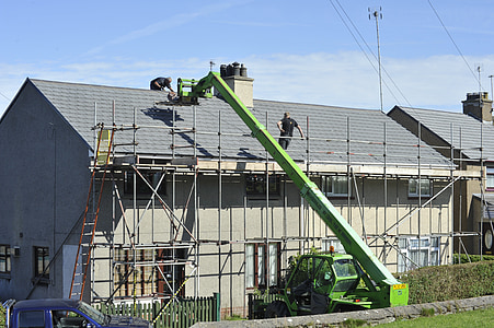 cherry picker working on roof thumbnail