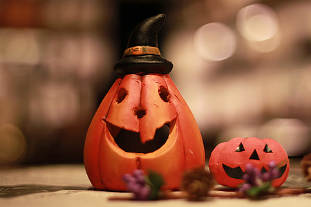 pumpkin heads on beige surfacef thumbnail