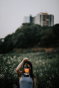 woman holding a lantern thumbnail