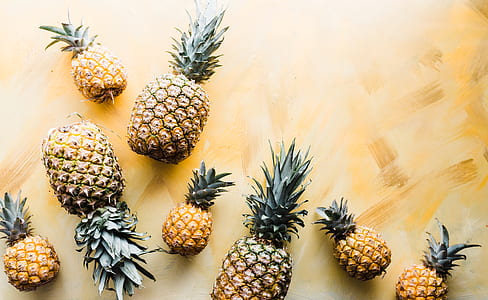 assorted pineapples photography during daytime thumbnail