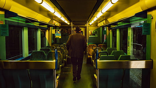 person walking on train seats thumbnail