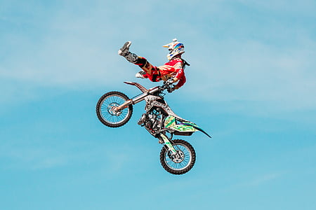 man doing air stunt on motocross dirt bike thumbnail
