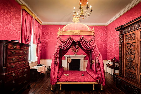 pink canopy bed between cabinet and drawer thumbnail