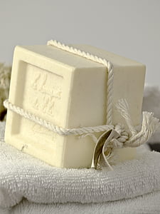 white cube soap on white towel thumbnail