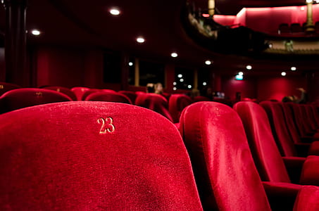 selective focus photography of red 23 chair thumbnail