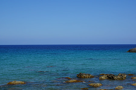 calm body of water during daytime thumbnail