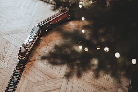 train toy under Christmas tree thumbnail