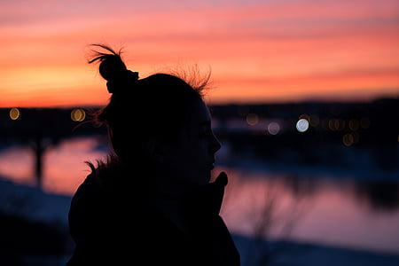 silhouette of woman wearing scarf thumbnail