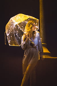 woman holding umbrella thumbnail