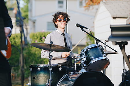 man playing drums thumbnail