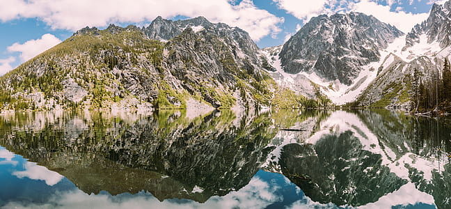 mountain near body of water thumbnail