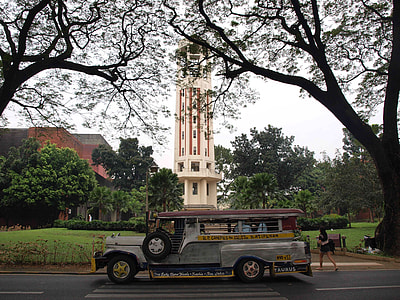 gray jeepney parked at pedestrian lane thumbnail