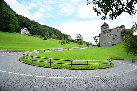 gray castle surrounded with grass thumbnail