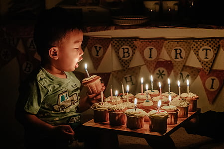boy holding cup cake thumbnail