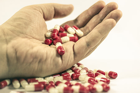 red-and-white medicine pills thumbnail