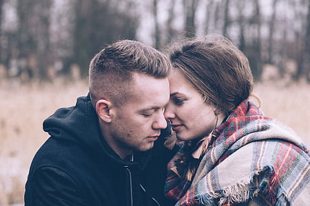 man near woman with plaid scarf thumbnail