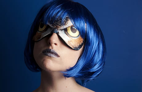 blue haired woman wearing owl eye patch thumbnail